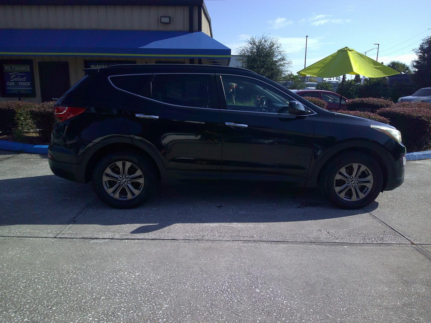 2013 BLACK HYUNDAI SANTA FE SPORT BASE (5XYZUDLB4DG) , located at 390 Hansen Avenue, Orange Park, FL, 32065, (904) 276-7933, 30.130497, -81.787529 - Photo#2